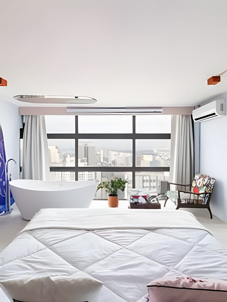 Cinema, Banheira e Cama King em Apto no Centro SP